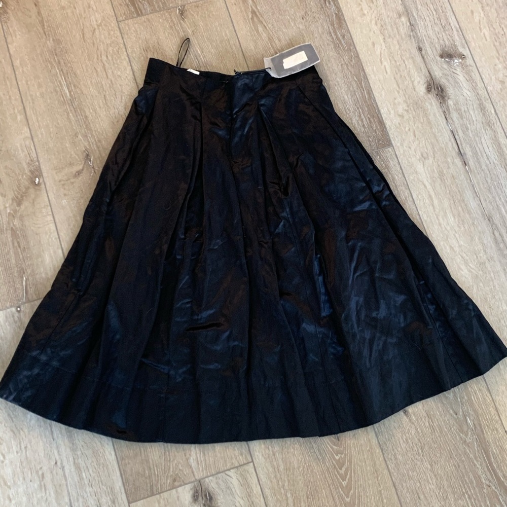 Mid length black skirt